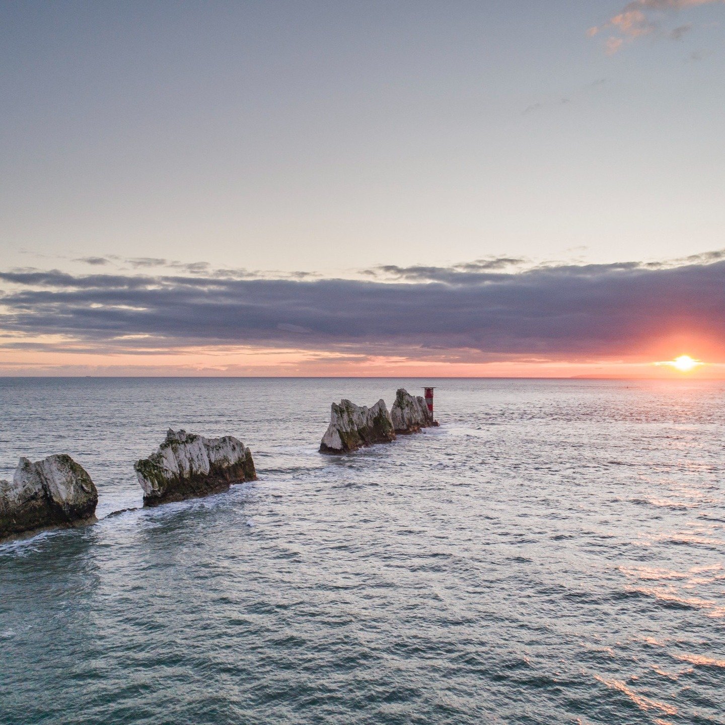 Golden hour at The Needles&hellip; does it get any better? 🌅🌊

This spot is hands down one of the most iconic views on the Isle of Wight, and if you time it right, the sunsets here are next level. Whether you're watching from the cliffs, taking a b